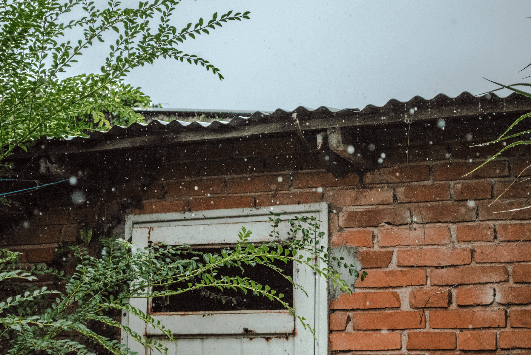 brick home on a rainy day