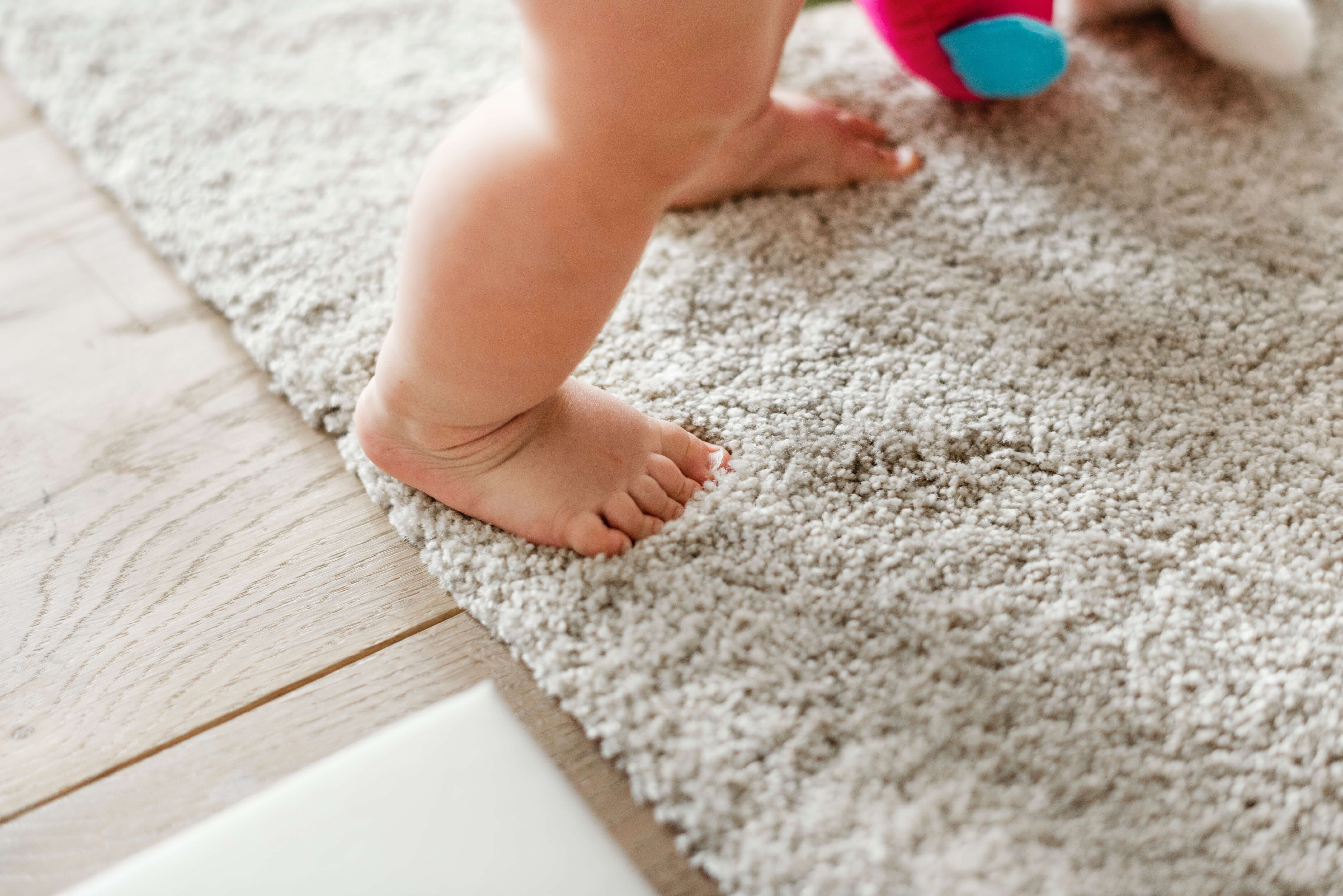 baby feet on carpet