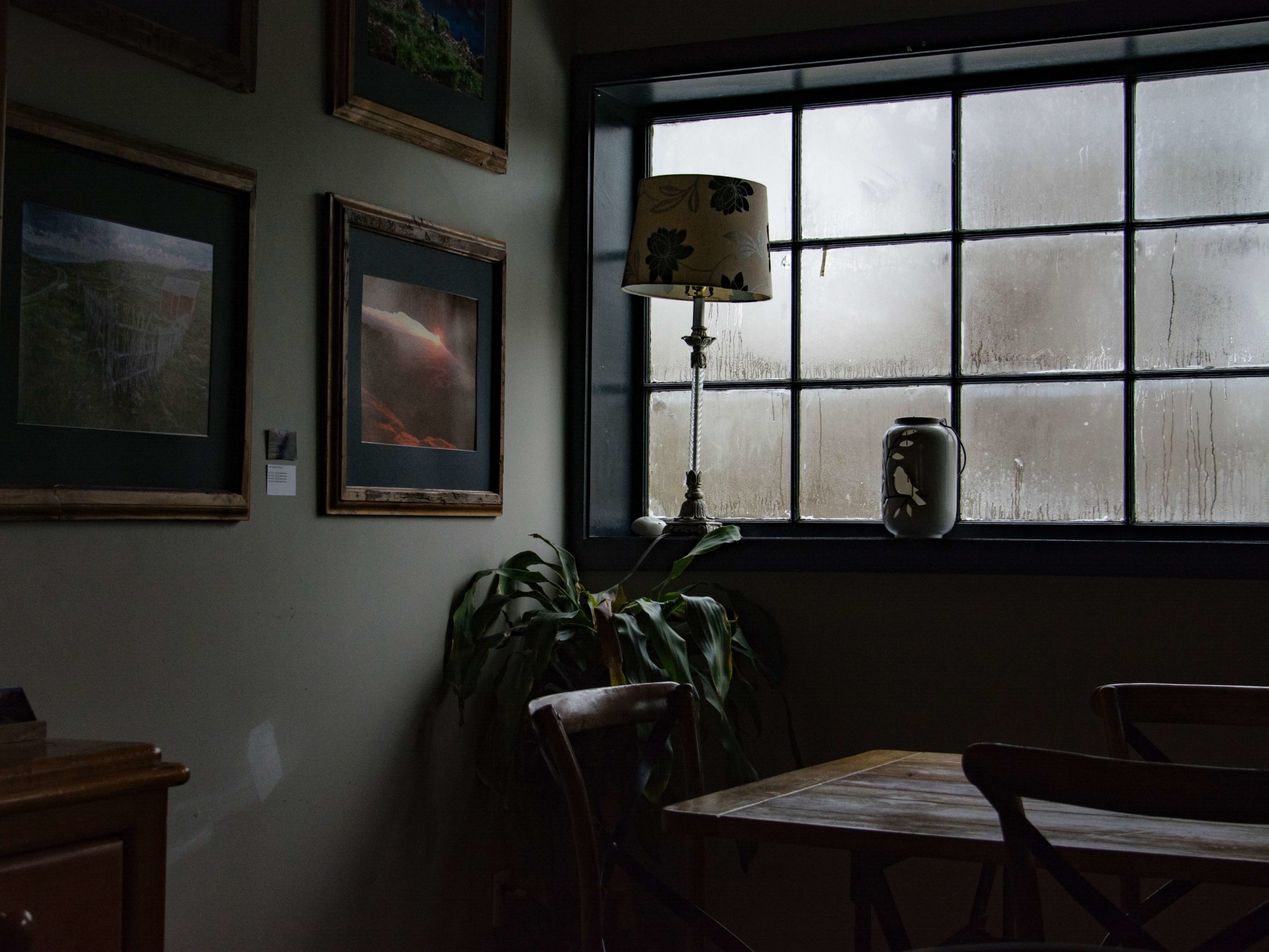 a dark living room on a rainy day